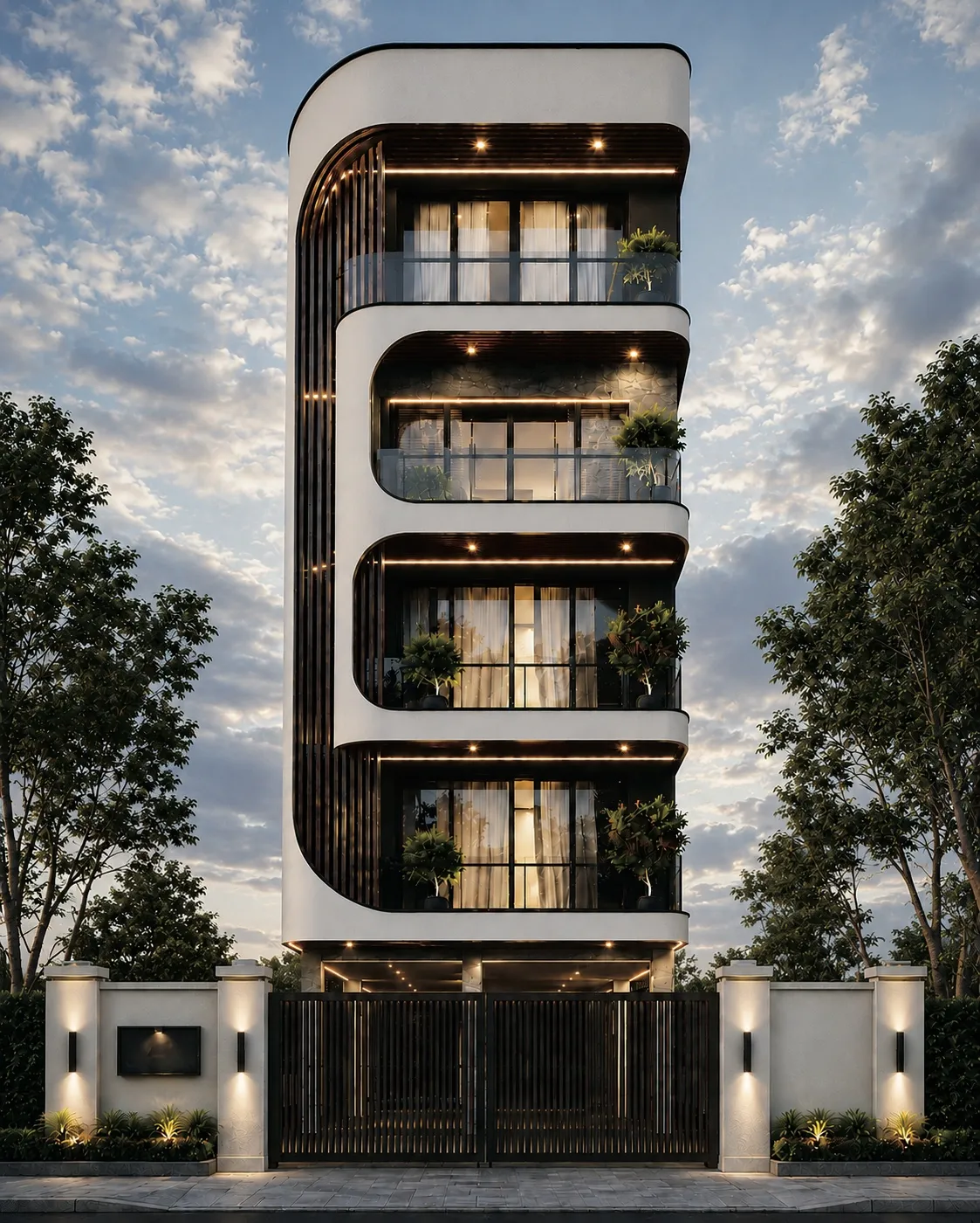 Dusk render of Anvaya — a four-storey residential building with a white frame wrapping rounded stacked balconies, in-filled with dark timber battens, behind a gated boundary wall